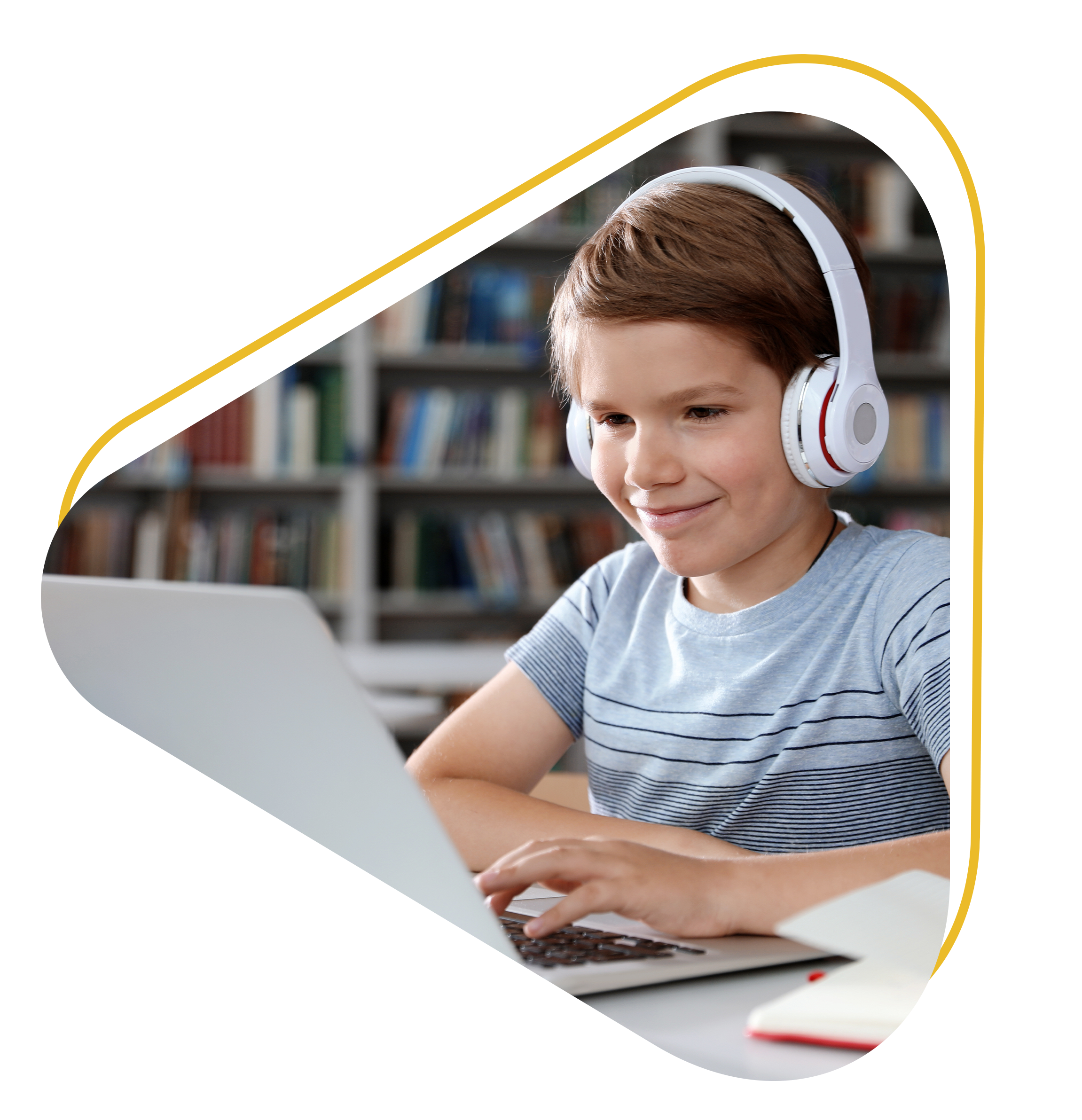 Boy on laptop with headphones taking MindPlay Universal Screener